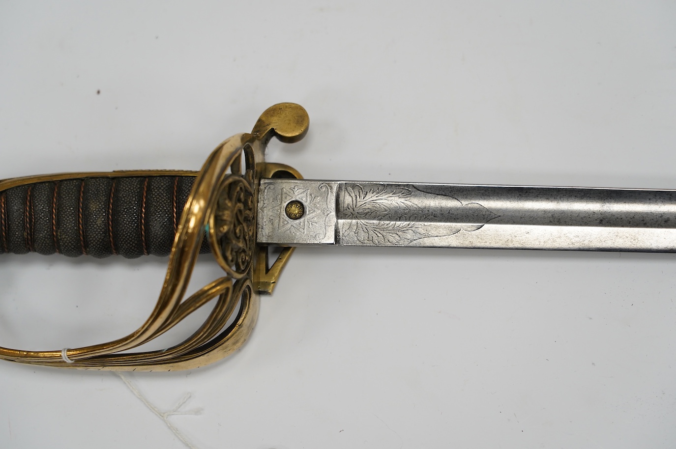 A Victorian 1845 pattern infantry officer’s sword, etched blade, regulation hilt, blade 81.5cm. Condition - good, some age wear